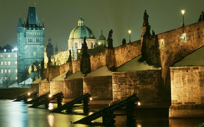 Charles Bridge at night in Prague, Czech Republic