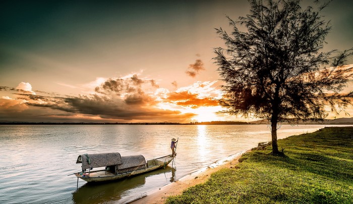 Boat on a river at sunset in Vietnam