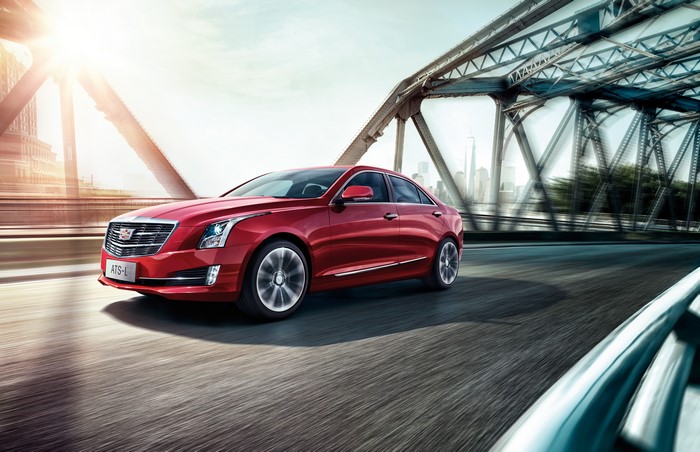 Red Cadillac ATS-L Sedan on a Bridge