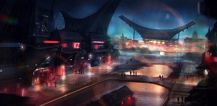 Futuristic city with large structures at night