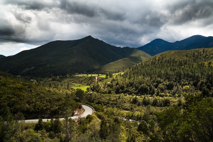 Mountainous landscape with winding road in Corsica, France