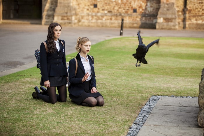 Two schoolgirls and a crow in Vampire Academy