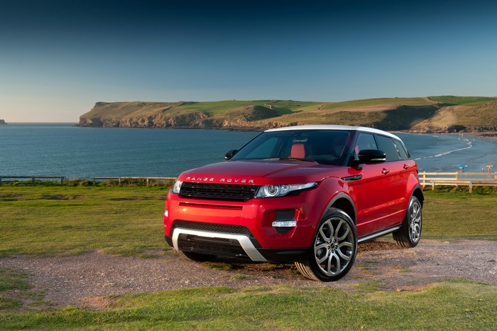 Red 2011 Range Rover Evoque Prestige on a Coast