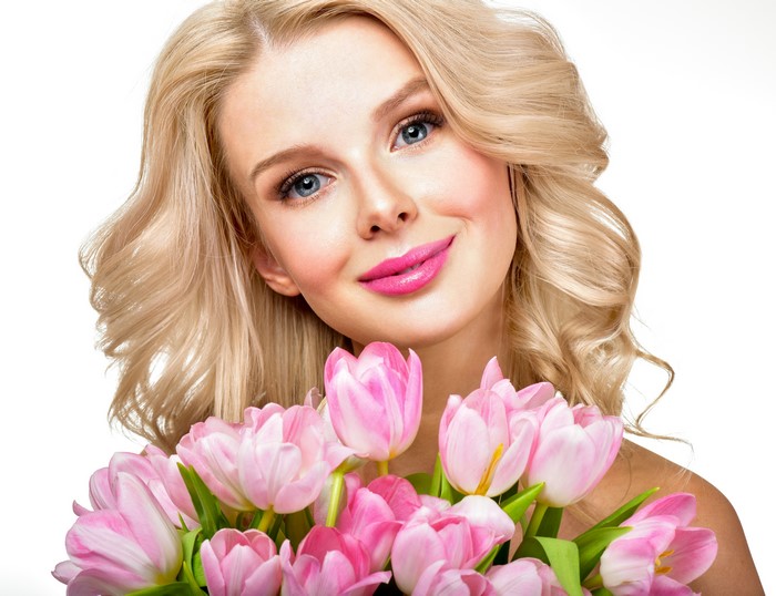 Blonde girl with pink tulips