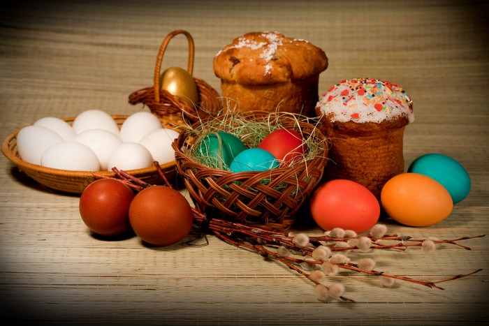 Easter Kulich and Eggs in Wicker Baskets
