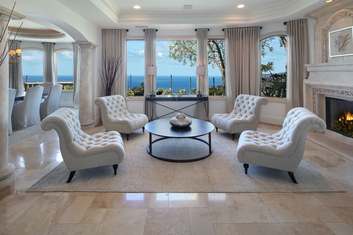 Living room with ocean view and fireplace