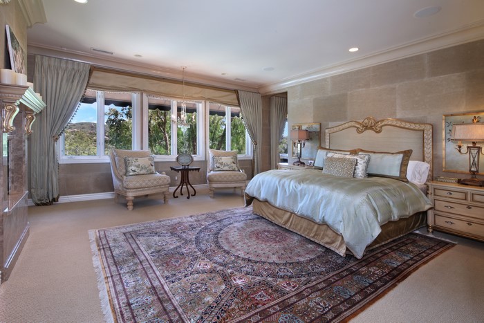 Luxury Bedroom with Large Bed and Sitting Area