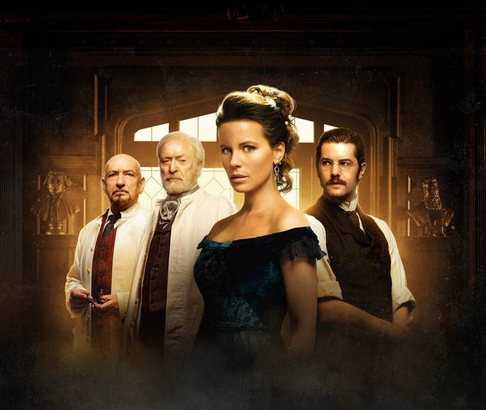 Kate Beckinsale and men in a room