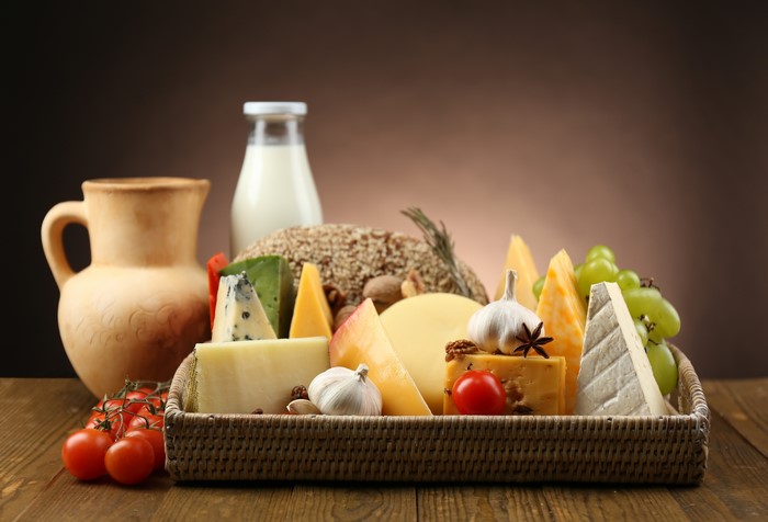 Cheese and Dairy Products with Jug and Tomatoes