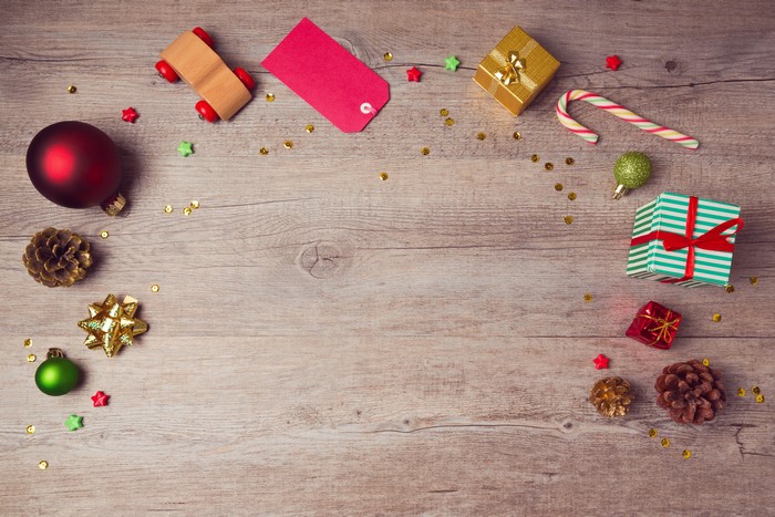 Christmas Gifts and Decorations on Wooden Background