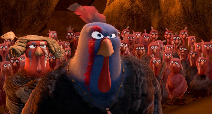 Reggie and Jake from Free Birds with a flock of turkeys