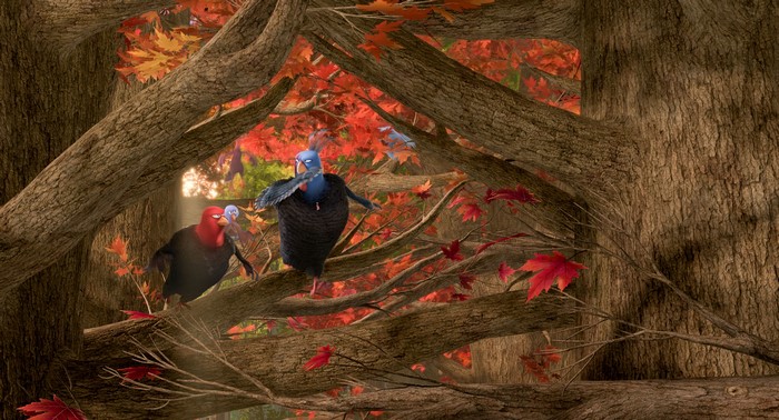 Turkeys in a forest during autumn