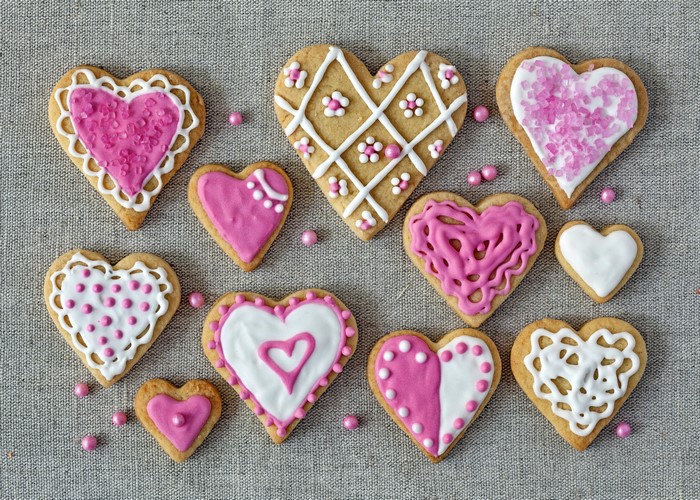 Heart-shaped cookies with pink and white icing