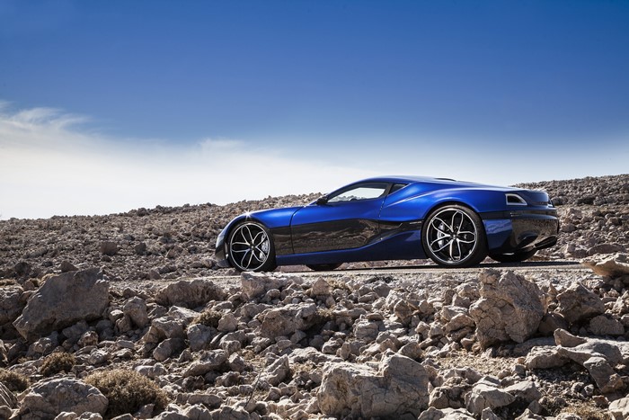 4K Rimac Concept One car on rocky terrain