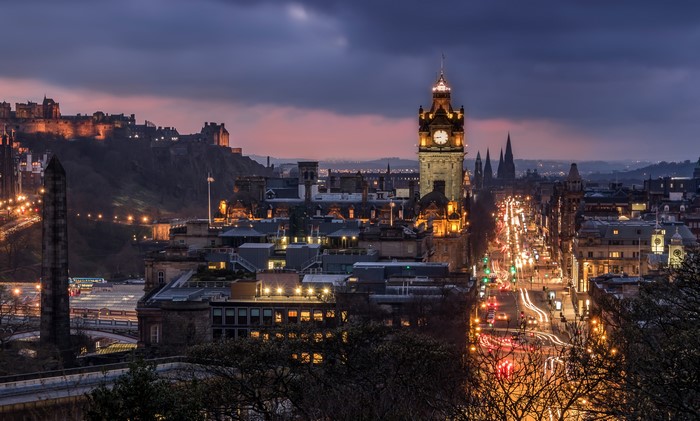 Edinburgh Castle and city street at night