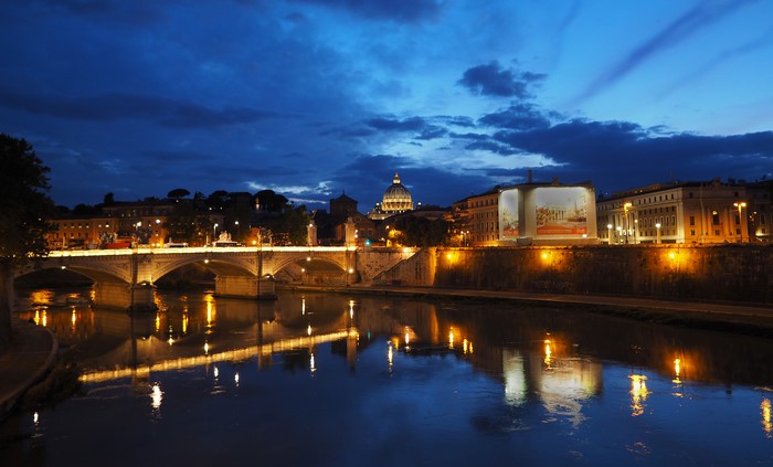 Rome at night with Tiber River and bridge