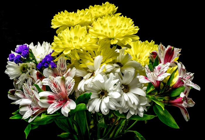 Bouquet of yellow chrysanthemums, white daisies, and alstroemeria lilies