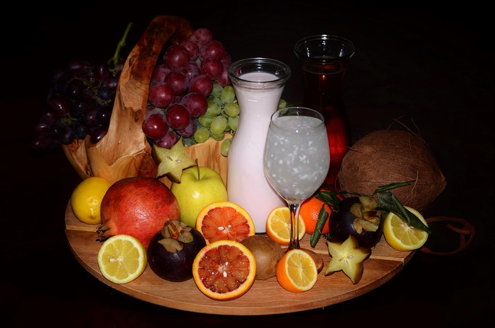 Fruit basket with milk and juice