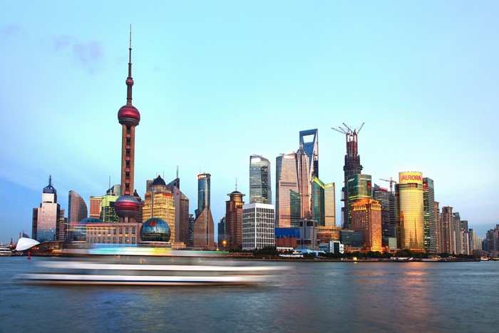 Shanghai skyline with Oriental Pearl Tower and skyscrapers at dusk