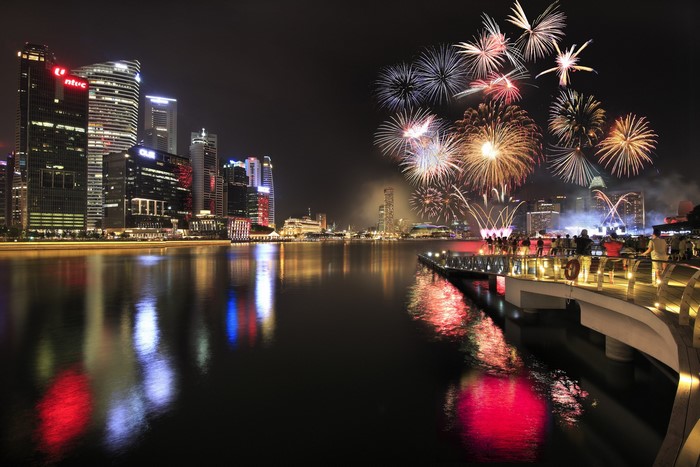 Singapore skyline with fireworks over the water