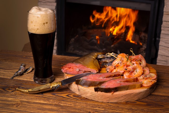 Beer, smoked fish, shrimp, and fireplace