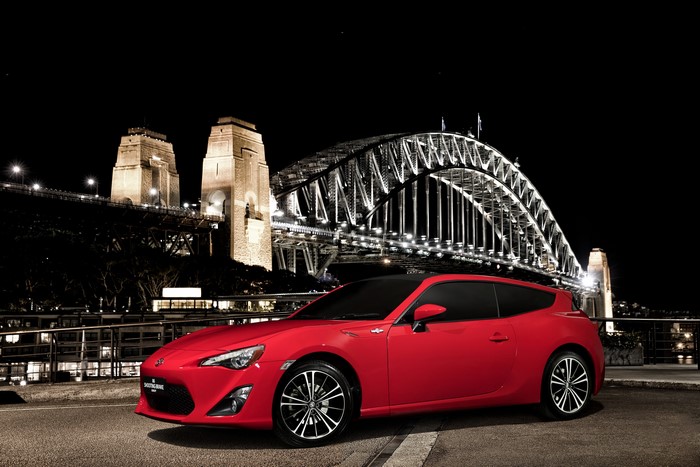 Red Toyota 86 Shooting Brake Concept car at night near Sydney Harbour Bridge