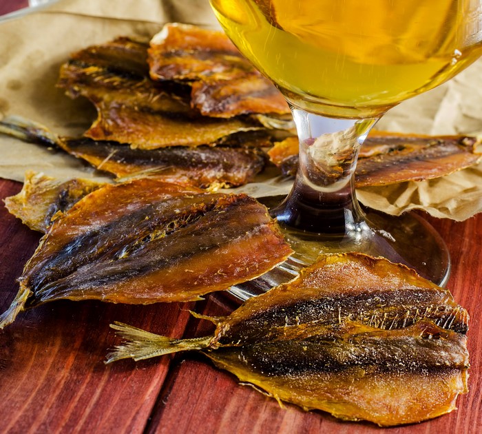 Dried fish and a glass of beer