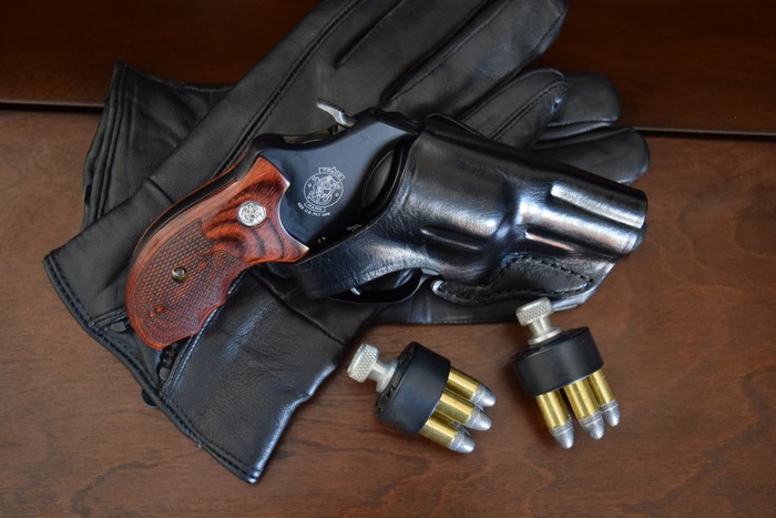 Smith & Wesson Revolver with Ammunition and Gloves