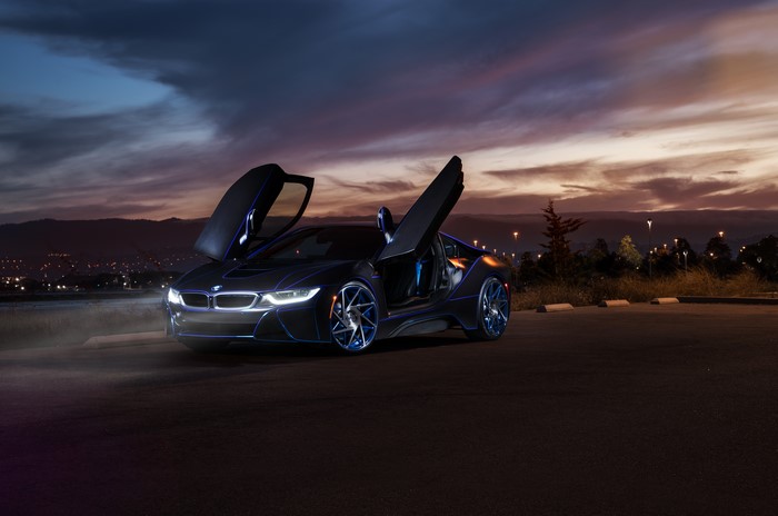 BMW i8 with butterfly doors at night