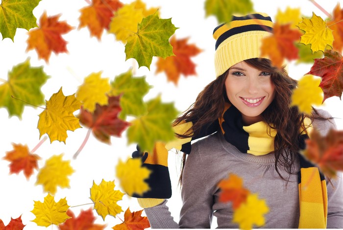 Woman in Winter Hat and Scarf with Falling Maple Leaves