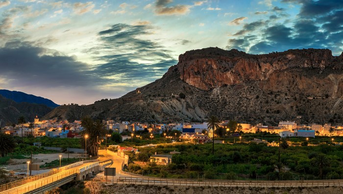 Ulea, Spain at Evening with Mountains and Street Lights