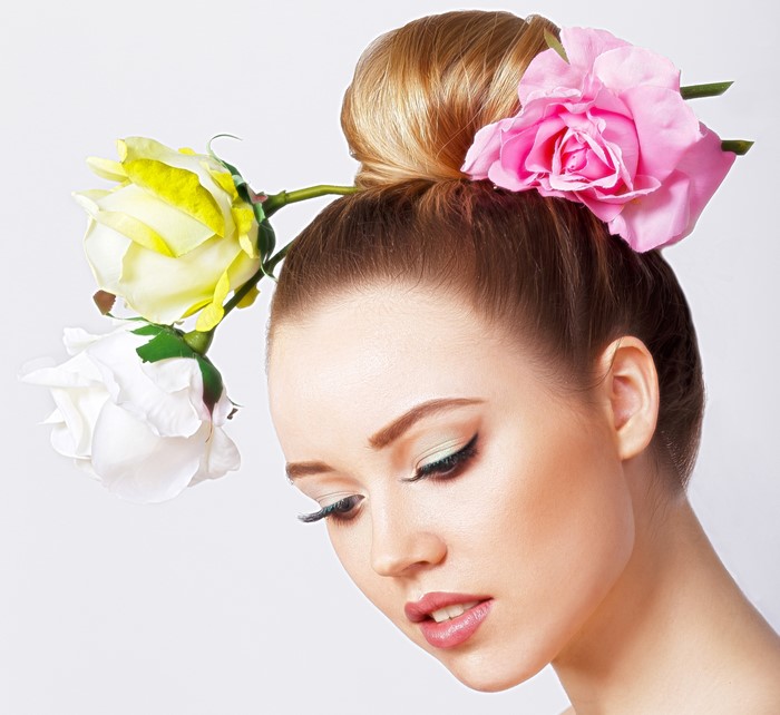 Woman with roses in her hair
