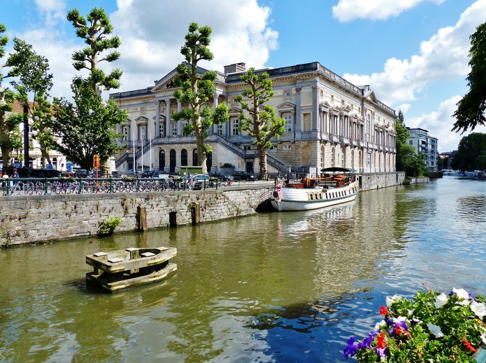 Ghent Canal with a Boat and Historic Building