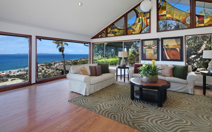 Living room with ocean view and stained glass