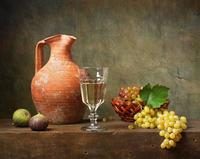 Still-life with wine, grapes, figs, and jug