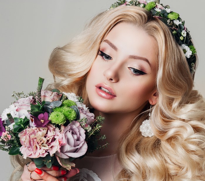 Blonde woman with flowers and bouquet