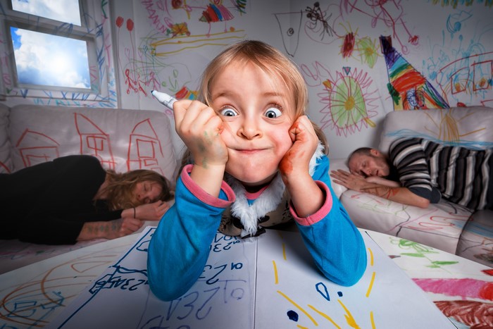 4K Playful Girl Drawing on Scribbled Walls