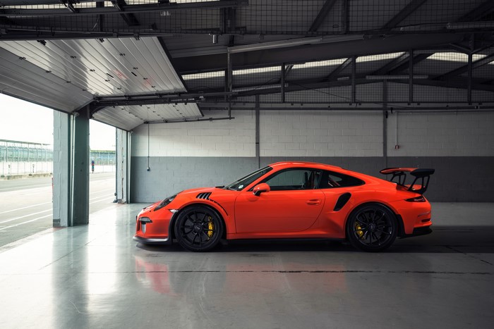 Orange Porsche 911 GT3 on Race Track