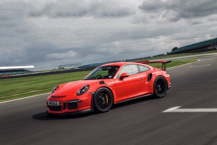 Red Porsche 911 GT3 on a Racetrack