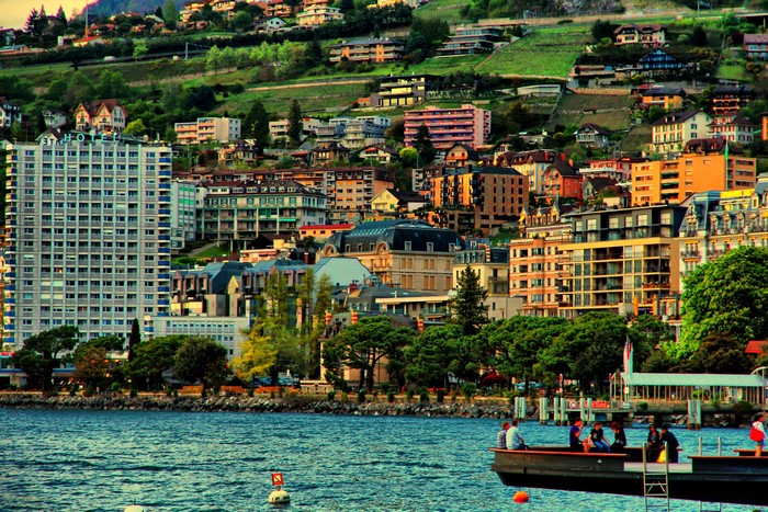 Montreux, Switzerland cityscape on a hillside overlooking a lake