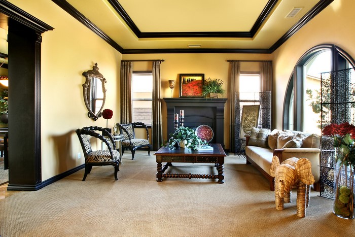 Living room with sofa, armchairs, and coffee table