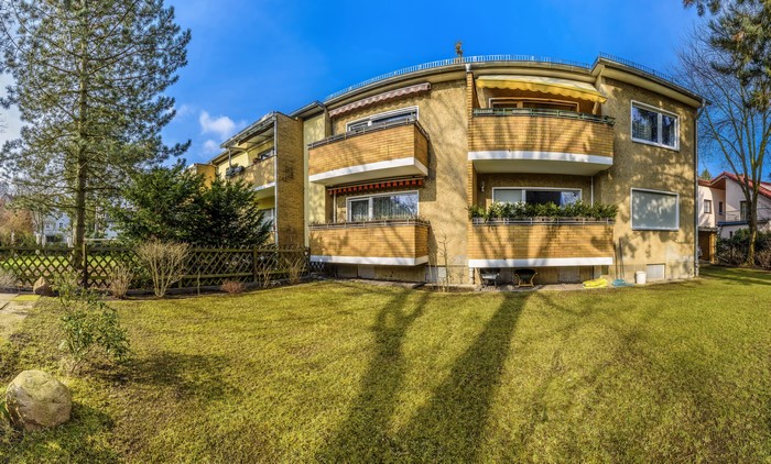 Apartment building in Berlin, Germany with grass