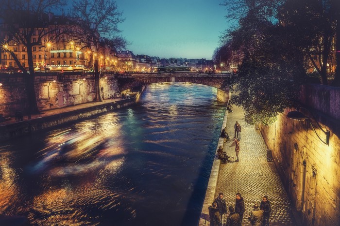 Parisian River at Night with Bridge and Buildings