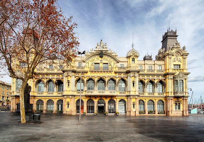 Port of Barcelona building with tree