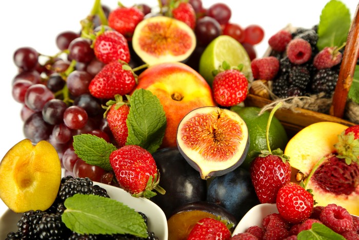 Assortment of Fresh Fruits: Grapes, Strawberries, Figs, and Berries