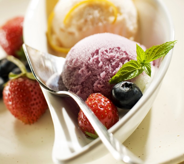 Ice cream with strawberries and blueberries