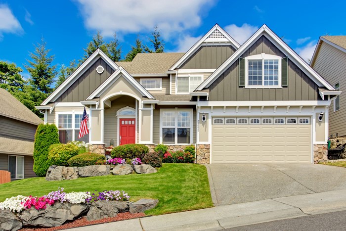 Luxury house with red door and garage