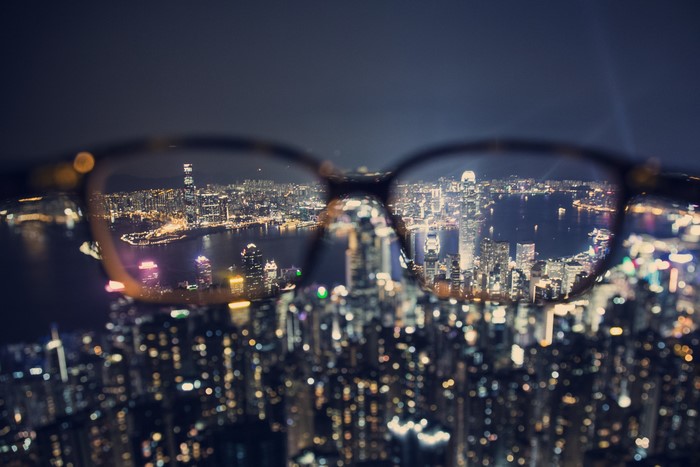 Hong Kong skyline through eyeglasses at night