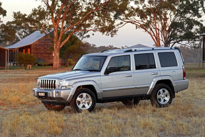 Silver Jeep Commander Limited in rural setting
