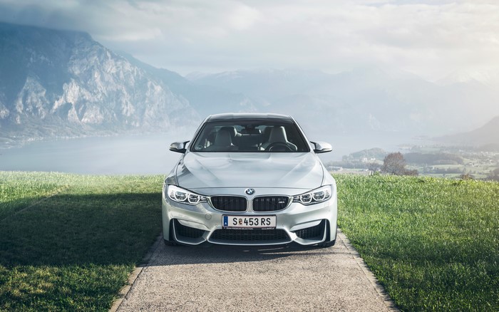 BMW M4 Front View with Mountain Landscape